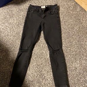 Black garage ripped skinny jeans